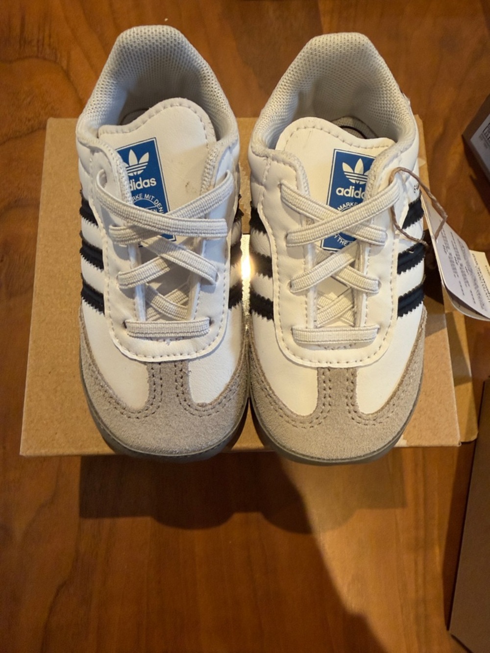 adidas crib shoes White Sneakers with Black Stripes and Gray Suede. Never worn